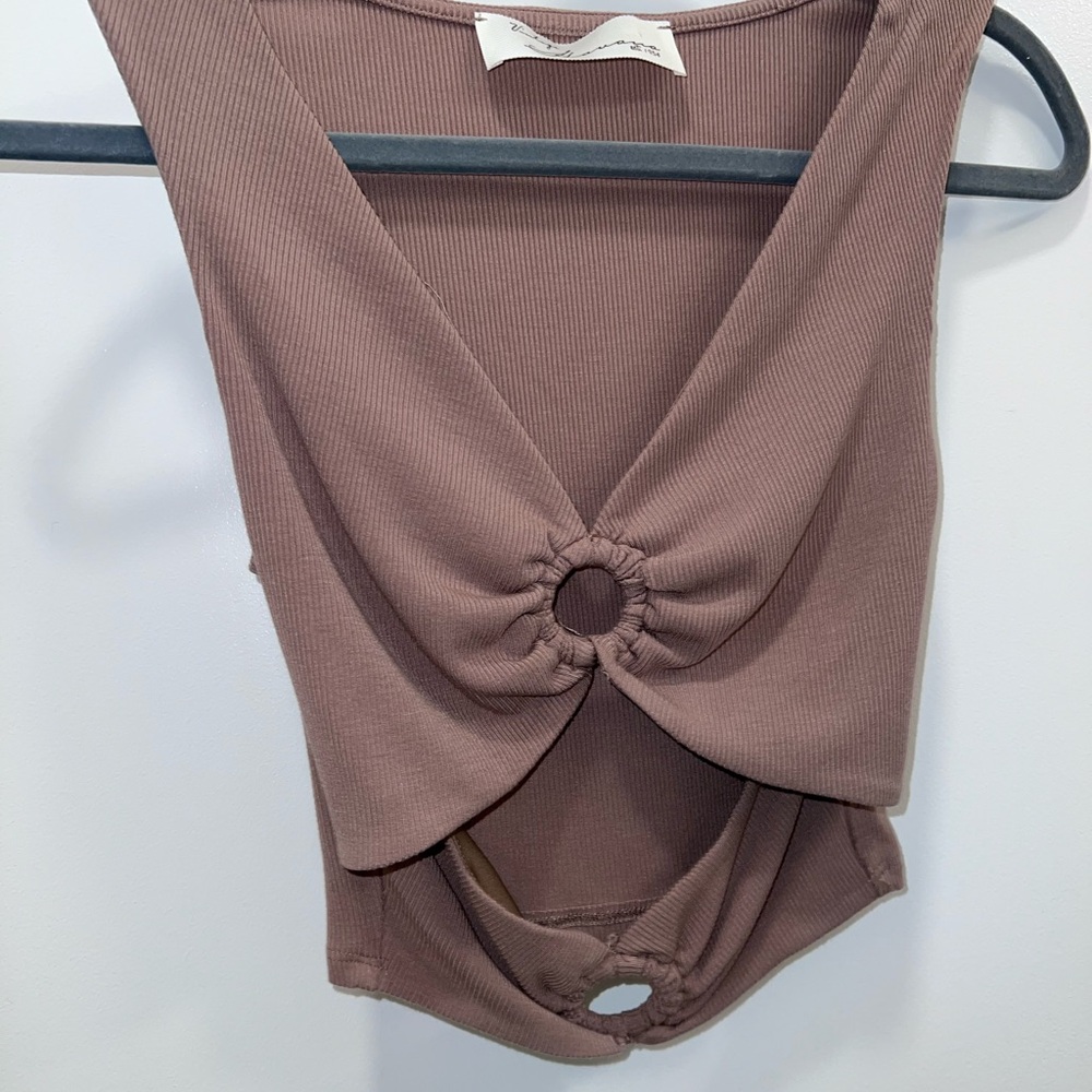 Cute crop top with cut outs and ring details